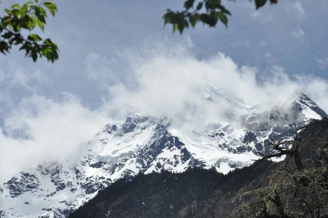 有個地方叫雨崩村,不去天堂就去雨崩徒步